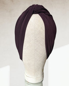 Cross turban in dark aubergine