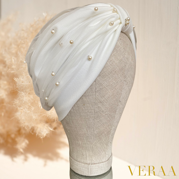 White tulle turban with champagne pearls