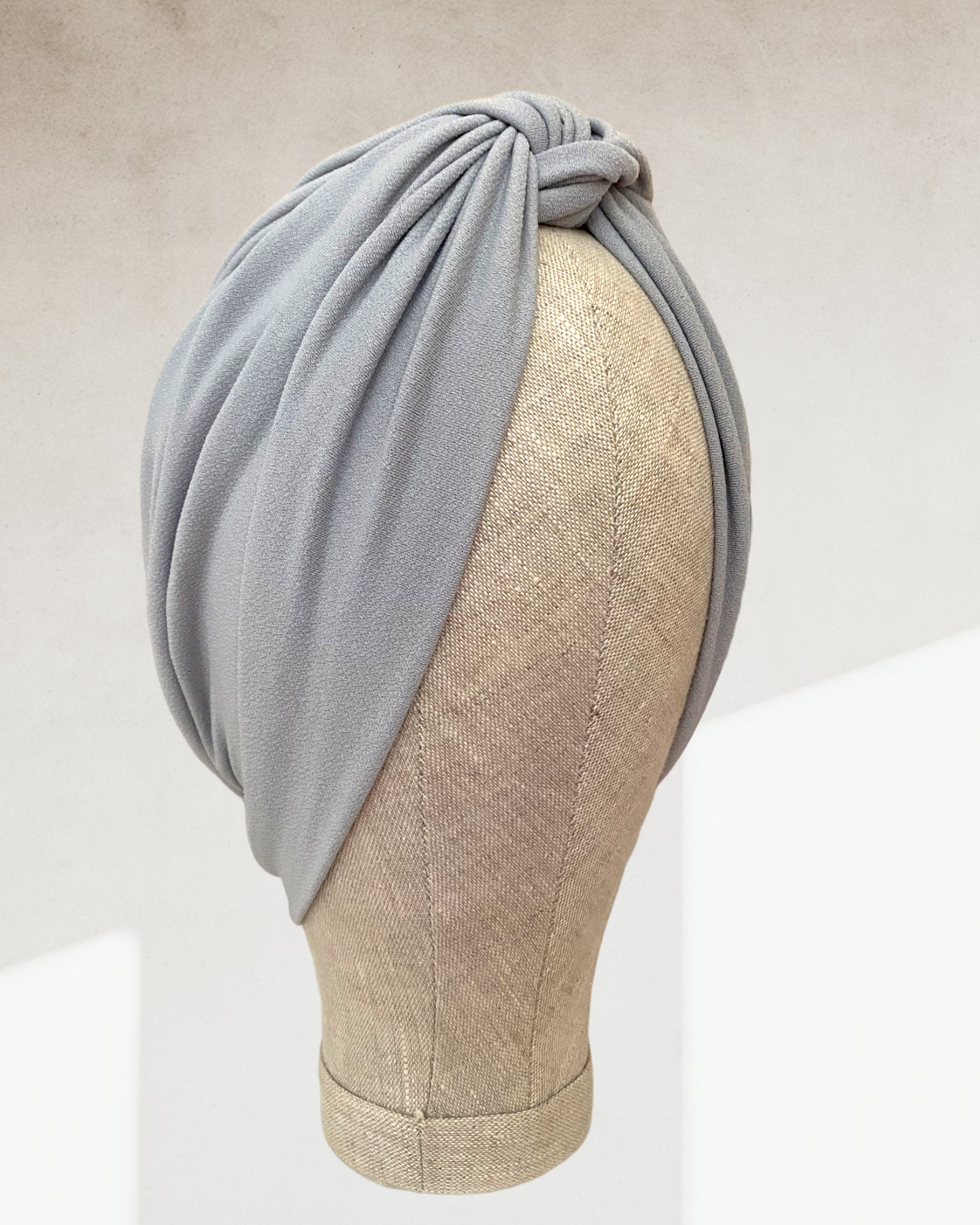 Light grey cross turban