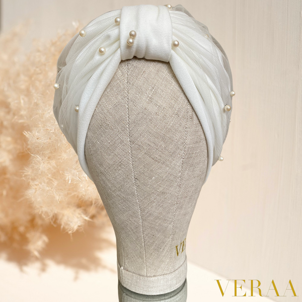 White tulle turban with champagne pearls